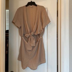 Tan romper with adjustable chest.